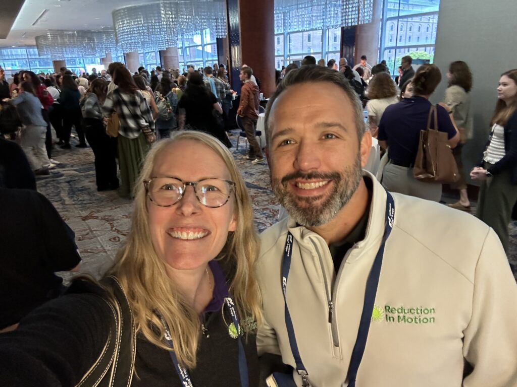 Kelsey and Zach at the conference